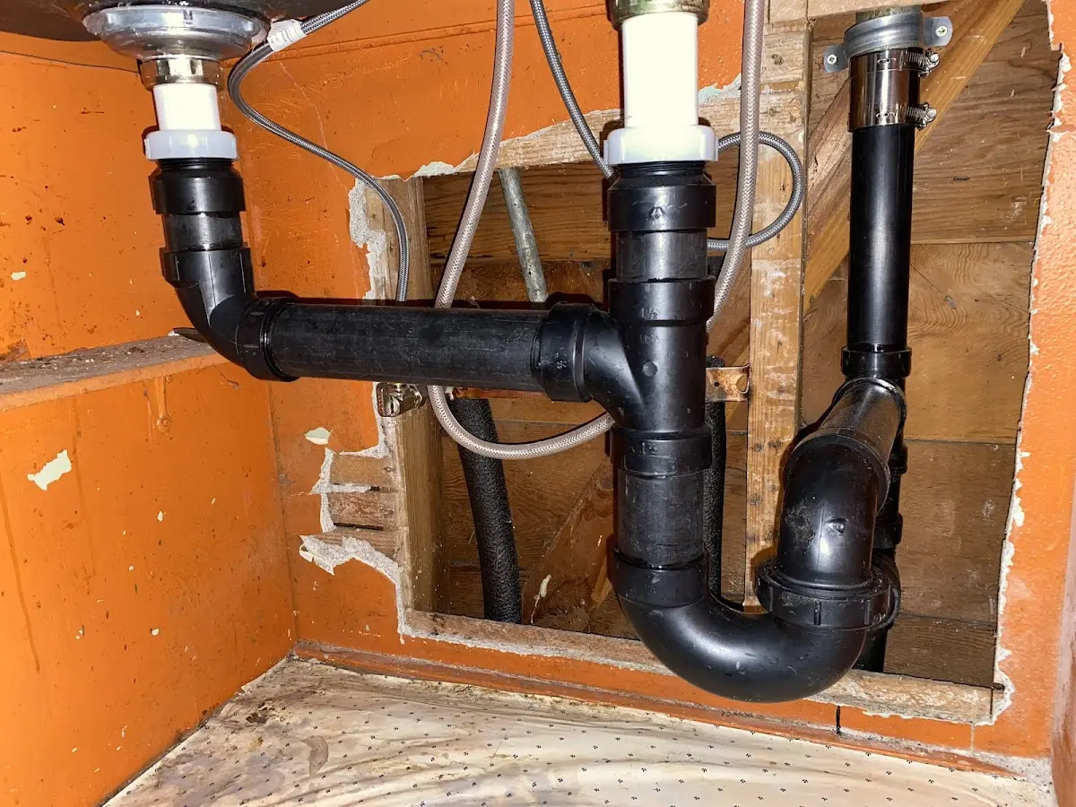 Professional Garbage Disposal Repair equipment and tools on the job in Rice Lake